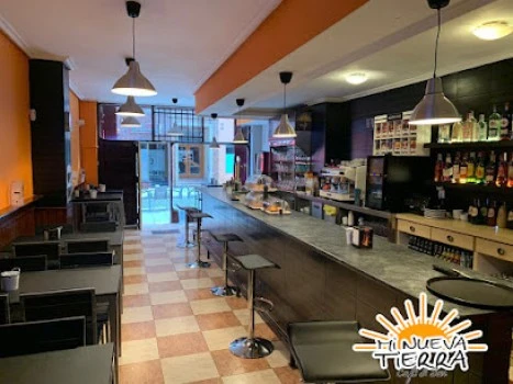 Mi Nueva Tierra Café &amp; Bar